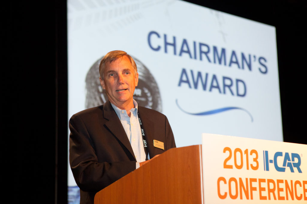Tom Moreland, seen here accepting the I-CAR Chairman's Award in 2013, will retire by the end of the year.